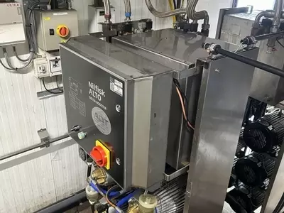 Rear view of custom stainless steel replacement tank installed on a Nilfisk Delta Booster multi-pump pressure washer system.